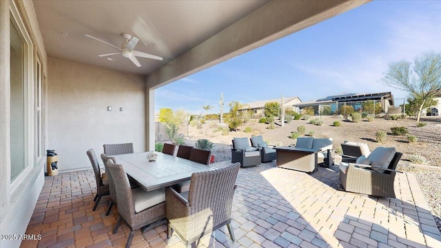 view of patio / terrace featuring an outdoor living space and ceiling fan