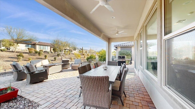 view of patio / terrace featuring ceiling fan and outdoor lounge area