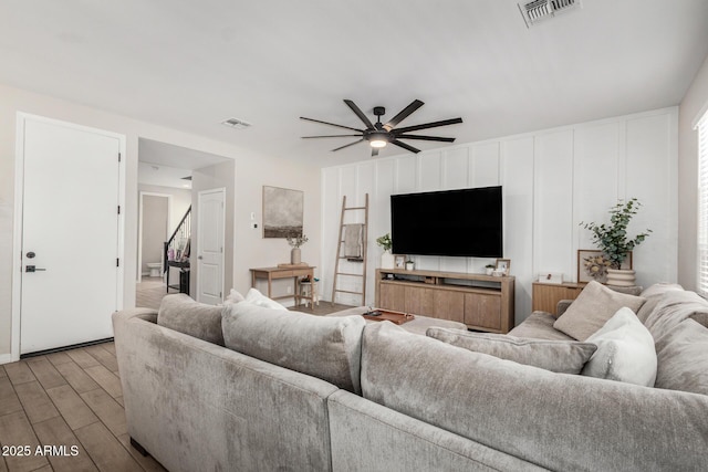 11526 E Shepperd Ave, Mesa, AZ 85212 - living room featuring a ceiling fan and light wood-style floors
