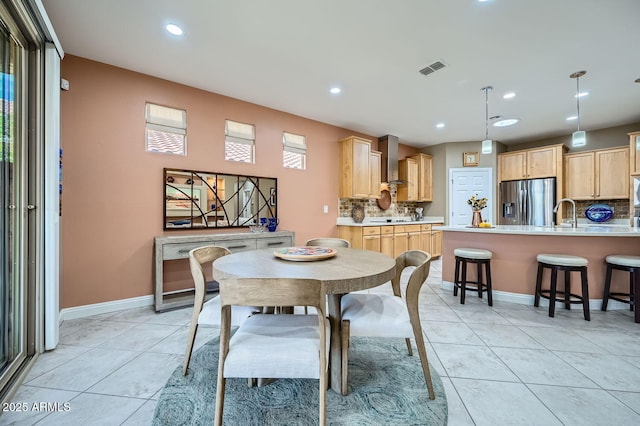 dining area featuring recessed lighting, light tile patterned flooring, visible vents, and baseboards