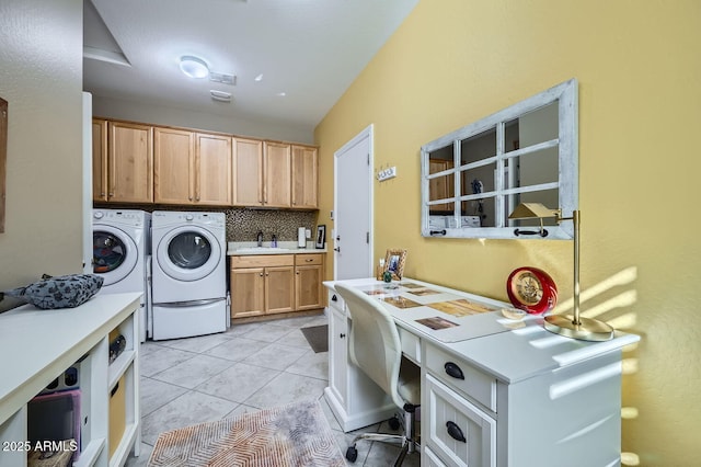 laundry room with light tile patterned floors, cabinet space, visible vents, a sink, and washer and dryer