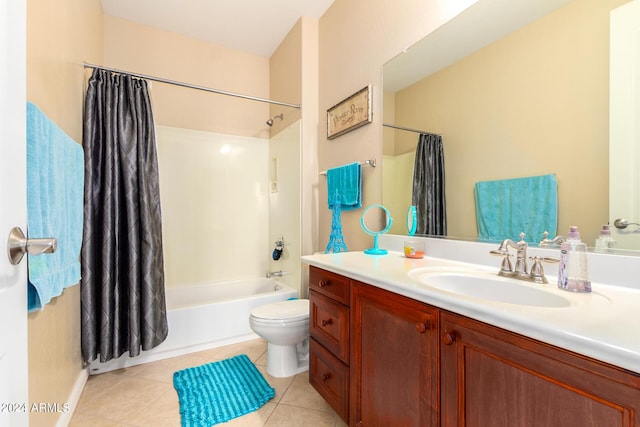 full bathroom featuring  shower combination, vanity, toilet, and tile patterned floors