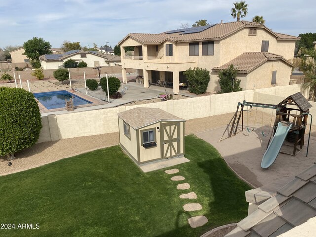 view of yard featuring fence and a mountain view