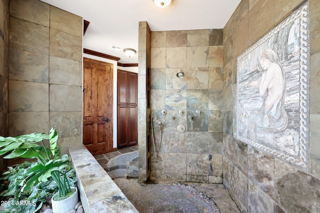 bathroom featuring tile walls