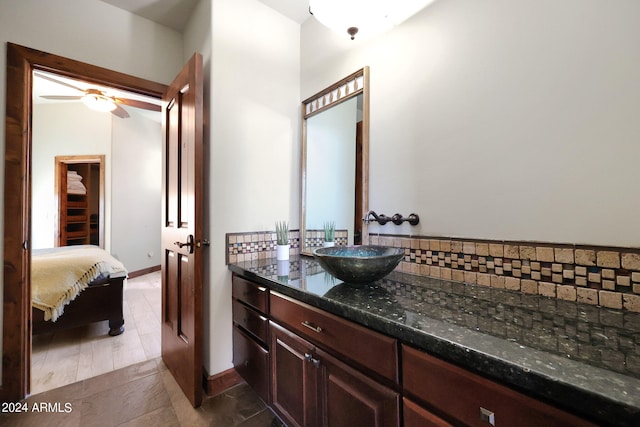 bathroom featuring vanity, ceiling fan, and hardwood / wood-style flooring