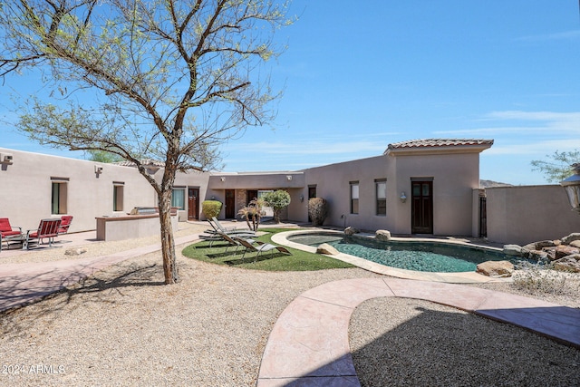 view of swimming pool featuring a patio area