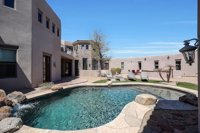 view of pool featuring a patio area