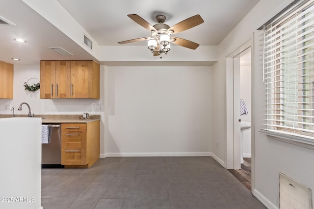 kitchen featuring visible vents, baseboards, dishwasher, and a ceiling fan