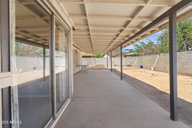 4631 N 77th Dr, Phoenix, AZ 85033 - view of patio featuring a fenced backyard and a playground