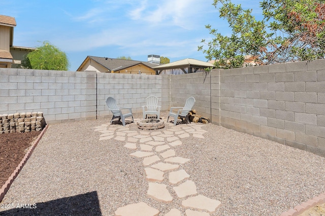 4631 N 77th Dr, Phoenix, AZ 85033 - view of patio / terrace featuring a fenced backyard and an outdoor fire pit