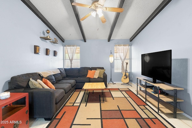 4631 N 77th Dr, Phoenix, AZ 85033 - living room featuring baseboards, a ceiling fan, a textured ceiling, and vaulted ceiling with beams