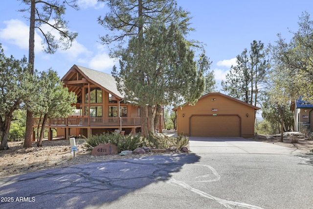 view of front of house featuring an outbuilding and a garage