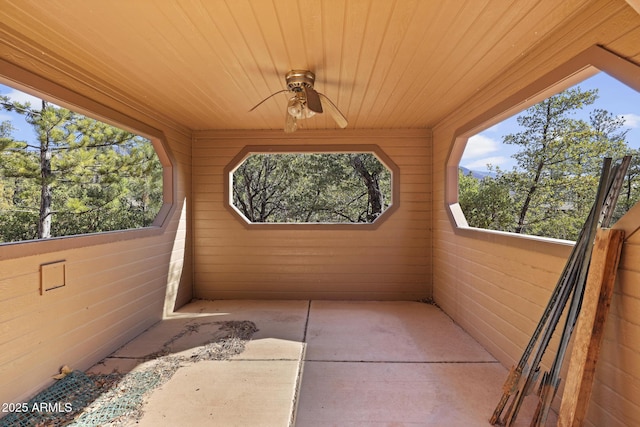 view of patio featuring ceiling fan