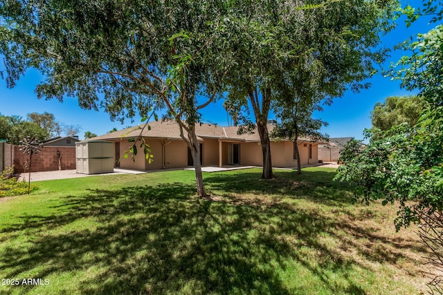 2956 E Concho Ave, Mesa, AZ 85204 - rear view of house with stucco siding and a patio