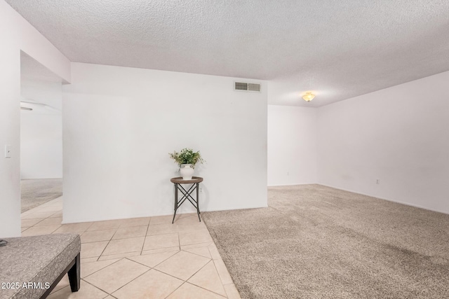 2956 E Concho Ave, Mesa, AZ 85204 - empty room with a textured ceiling and light tile patterned floors