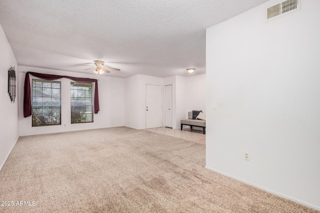2956 E Concho Ave, Mesa, AZ 85204 - unfurnished room with ceiling fan, light colored carpet, and a textured ceiling