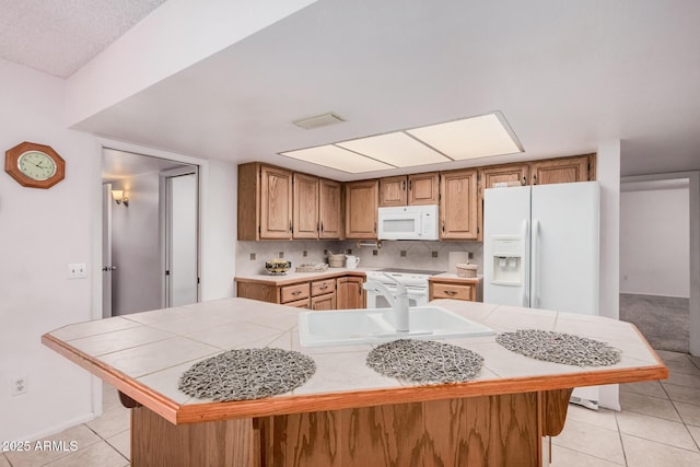 2956 E Concho Ave, Mesa, AZ 85204 - kitchen featuring white appliances, light tile patterned floors, tile countertops, and a center island