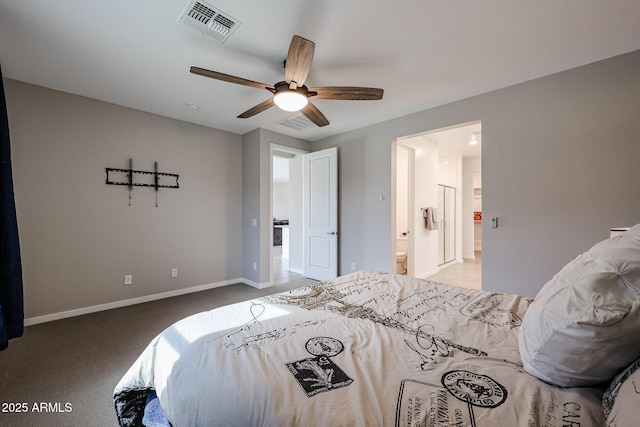 bedroom with carpet flooring, a ceiling fan, visible vents, baseboards, and ensuite bath