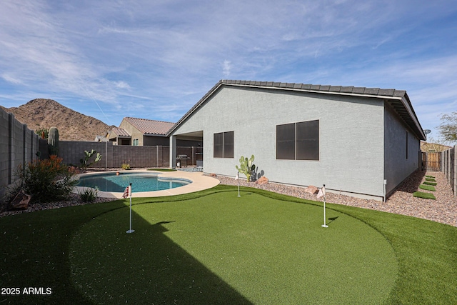 view of pool with a fenced backyard and a fenced in pool