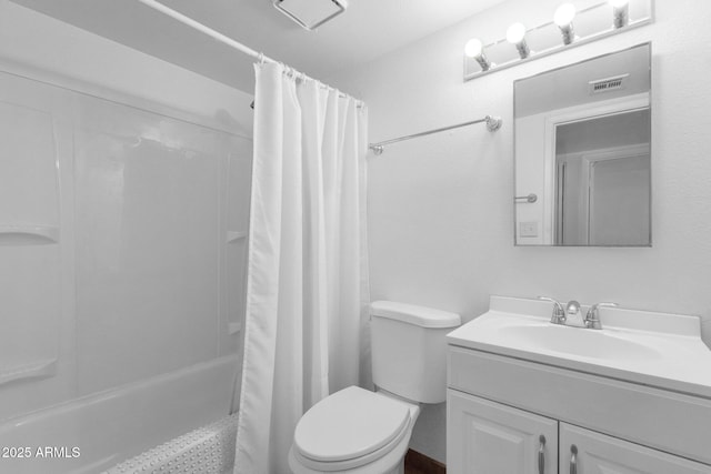 full bathroom with vanity, toilet, and shower / bath combo with shower curtain