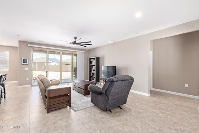 living room featuring ceiling fan