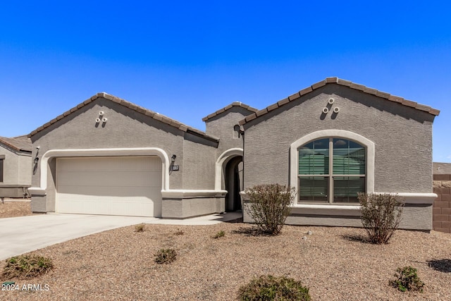 view of front of property featuring a garage