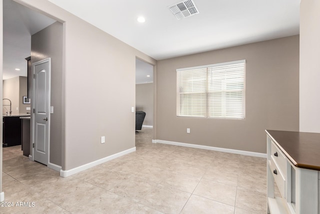 interior space with light tile patterned floors