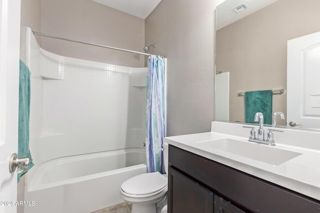 full bathroom with toilet, vanity, and shower / bath combo