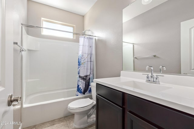 full bathroom featuring toilet, vanity, shower / tub combo, and tile patterned flooring