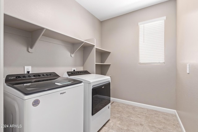 laundry area with washer and dryer