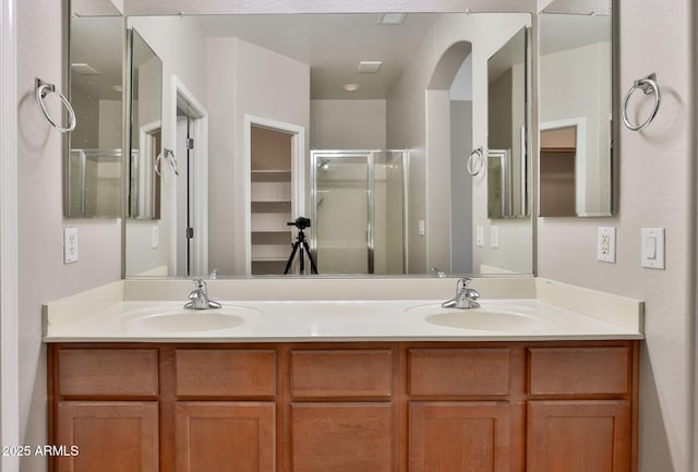 14870 W Encanto Blvd Unit 1038, Goodyear, AZ 85395 - full bath featuring double vanity and a shower stall