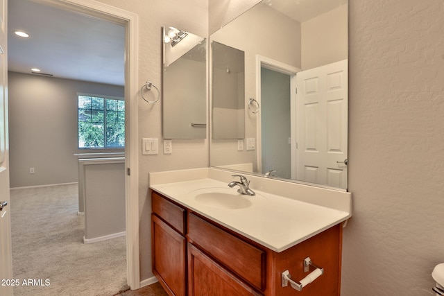 14870 W Encanto Blvd Unit 1038, Goodyear, AZ 85395 - bathroom with vanity and a textured wall