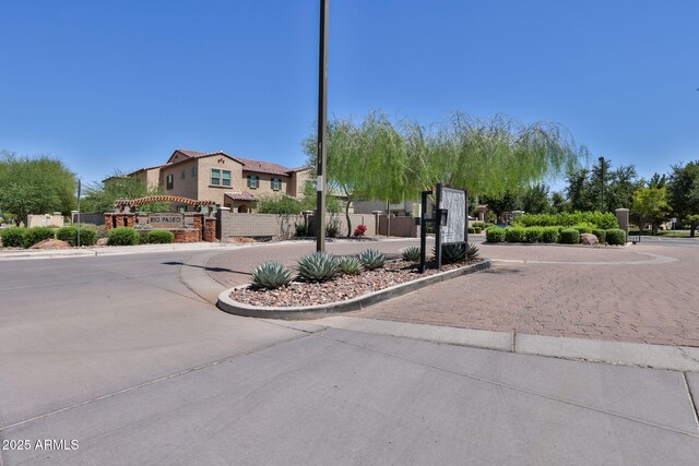 14870 W Encanto Blvd Unit 1038, Goodyear, AZ 85395 - view of front facade featuring a gate