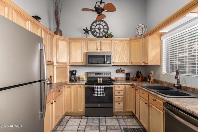 1214 W Sand Dune Dr, Gilbert, AZ 85233 - kitchen featuring stainless steel appliances, a sink, light brown cabinets, a ceiling fan, and stone finish flooring