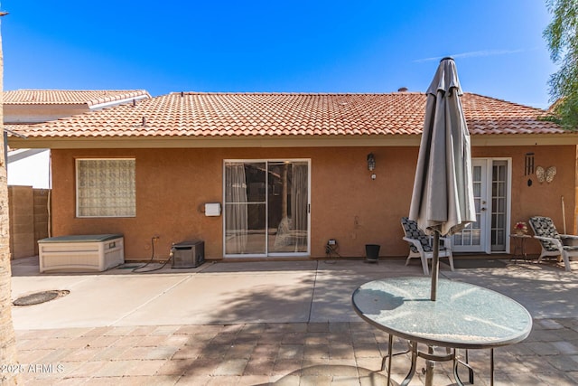1214 W Sand Dune Dr, Gilbert, AZ 85233 - rear view of property featuring stucco siding, a patio, and a tile roof