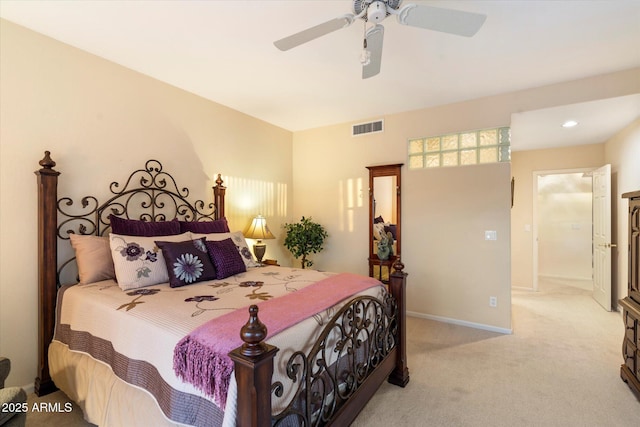 bedroom featuring light carpet, baseboards, visible vents, and ceiling fan