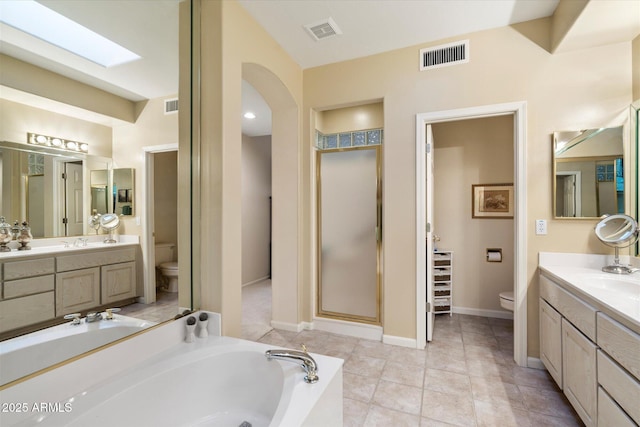 full bathroom with visible vents, a sink, and toilet