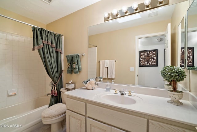 full bath with shower / tub combo, visible vents, vanity, and toilet