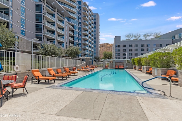 view of pool featuring a patio