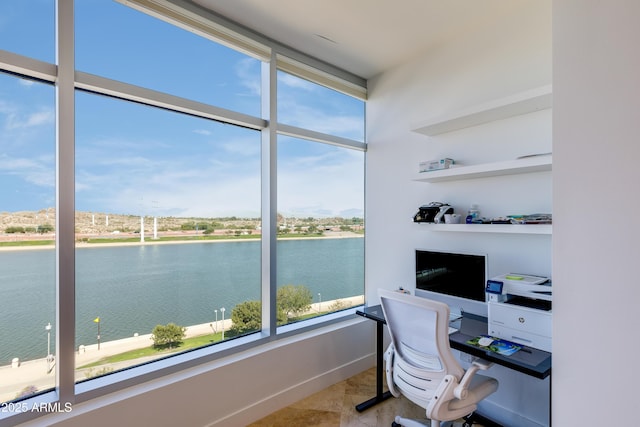 home office featuring light tile patterned floors