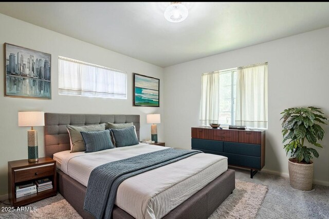 1945 E Solano Dr, Phoenix, AZ 85016 - bedroom with carpet floors and baseboards