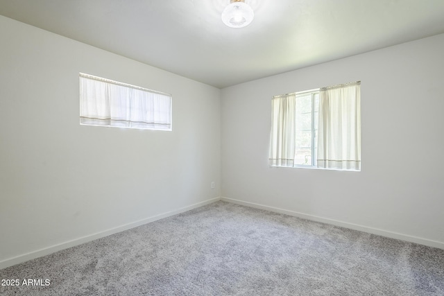 1945 E Solano Dr, Phoenix, AZ 85016 - carpeted empty room featuring baseboards