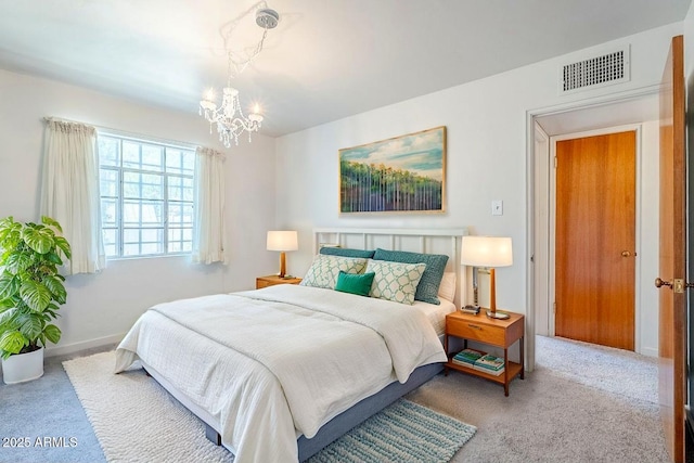 1945 E Solano Dr, Phoenix, AZ 85016 - bedroom with carpet flooring and a chandelier