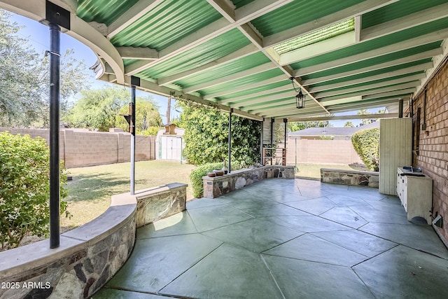1945 E Solano Dr, Phoenix, AZ 85016 - fenced backyard featuring a patio area and a shed