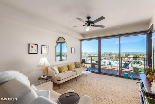 living room featuring ceiling fan