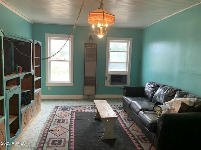 living room with cooling unit and a chandelier