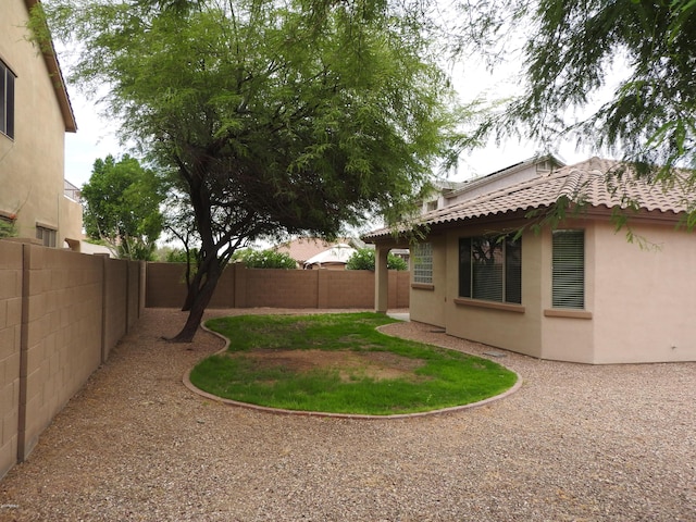 view of yard featuring a fenced backyard