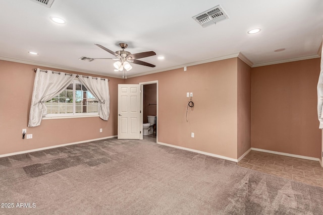 carpeted spare room with a ceiling fan, visible vents, baseboards, recessed lighting, and crown molding