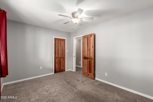 carpeted empty room with baseboards and ceiling fan