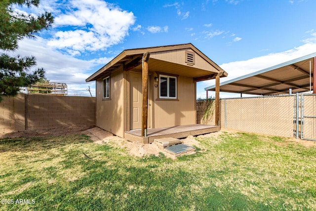 view of shed with a fenced backyard